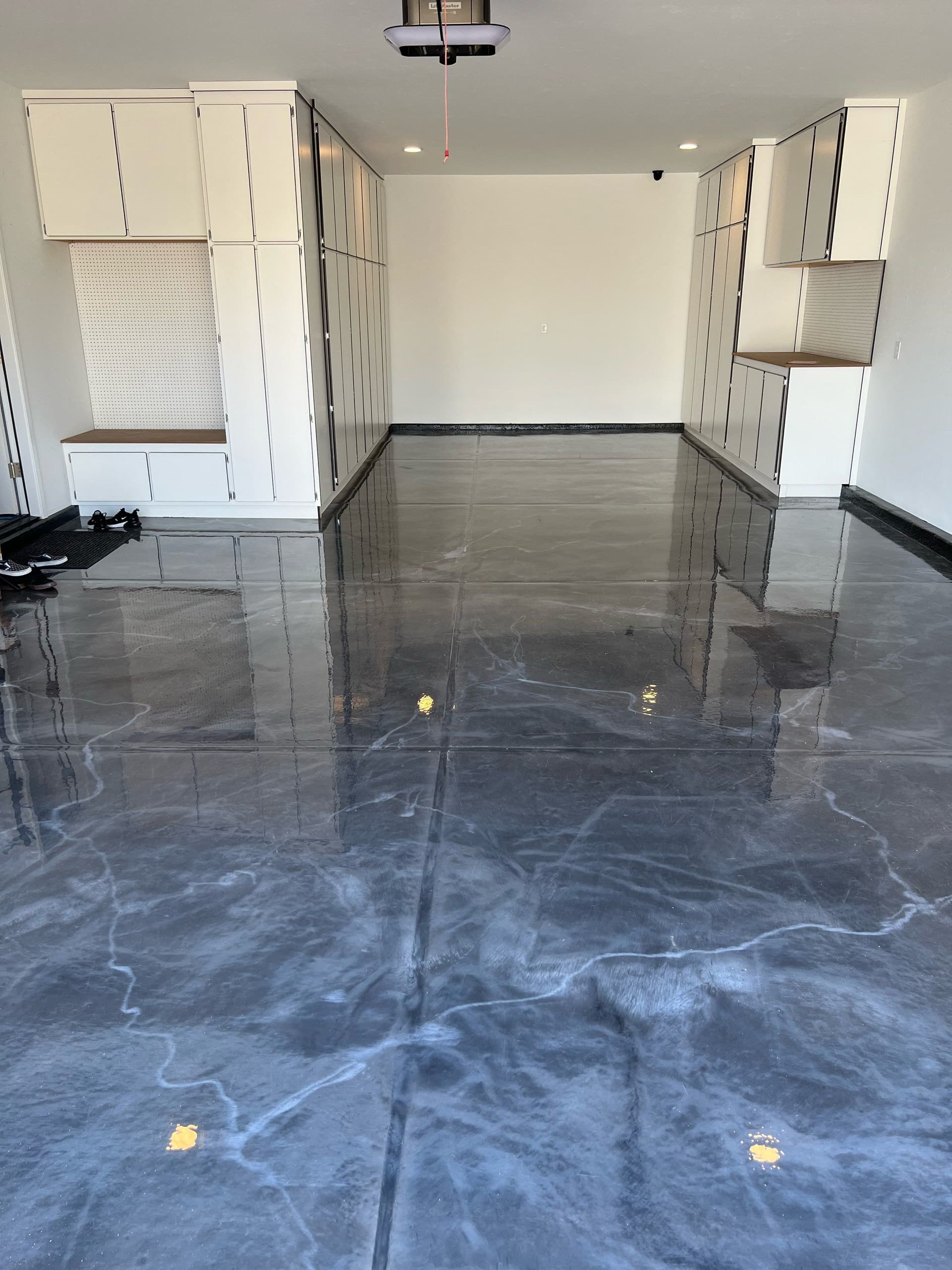 Stunning Metallic Epoxy Garage Makeover image